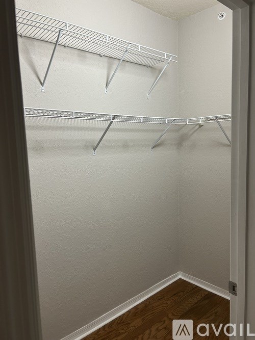 Empty pantry with three shelves.