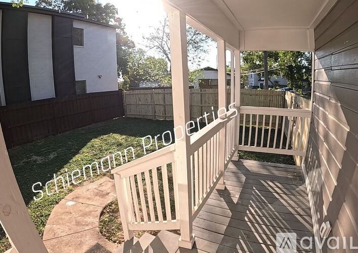 A Schemmann Propertiy sign is displayed on a deck.