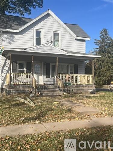 A house with a porch and a front door.
