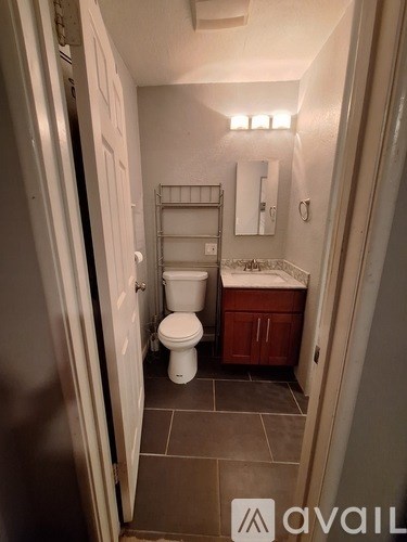 A small bathroom with a toilet and sink.
