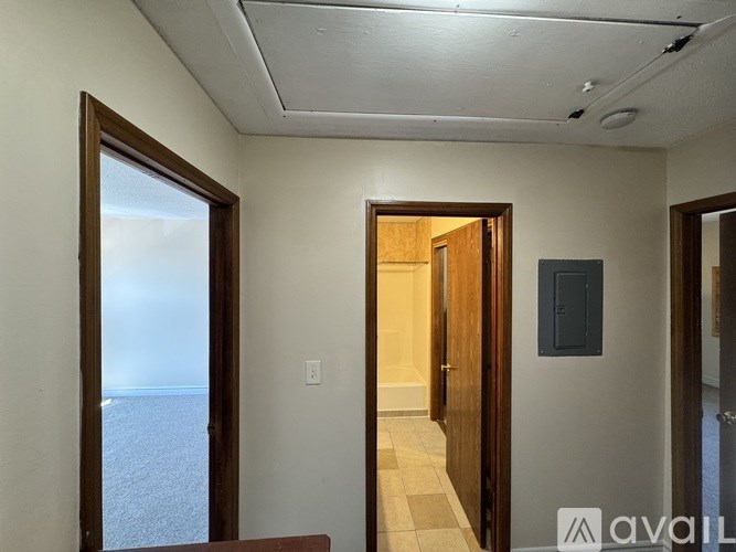 A room with a door and a window.