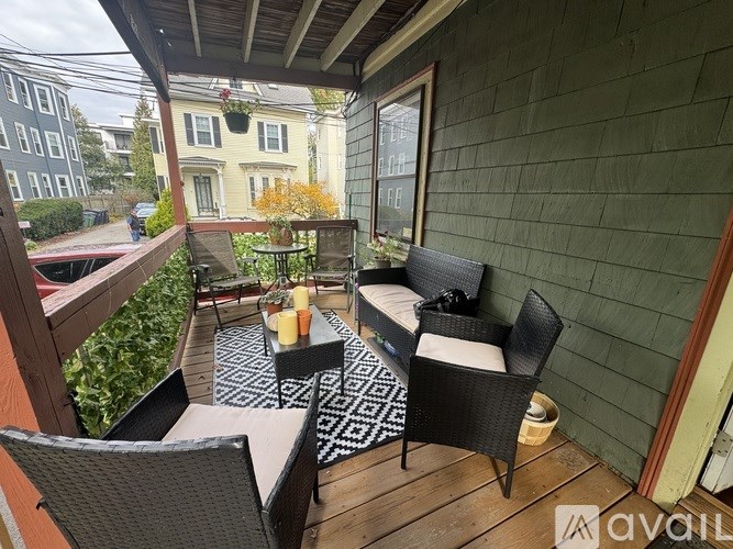 A patio with a table and chairs is shown.