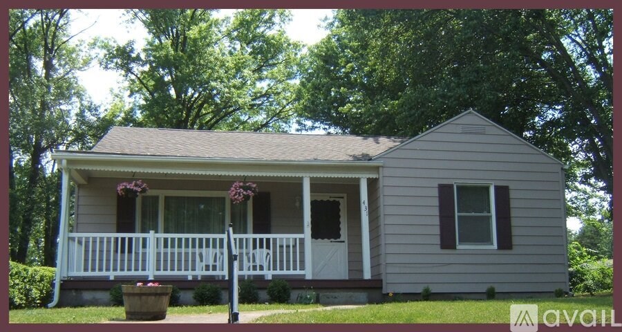 A small house with a porch and a sign that says "available".
