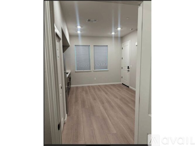 A blurry image of a building with a window.