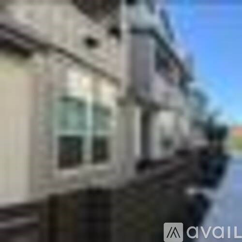 A blurry image of a building with a window.