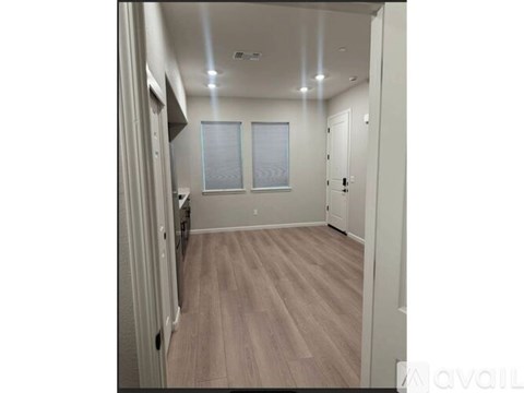 A blurry image of a building with a window.