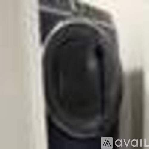 A close up of a black object with a logo that reads "avaiL".