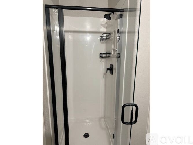 A blurry image of a room with a sign that says "avail".