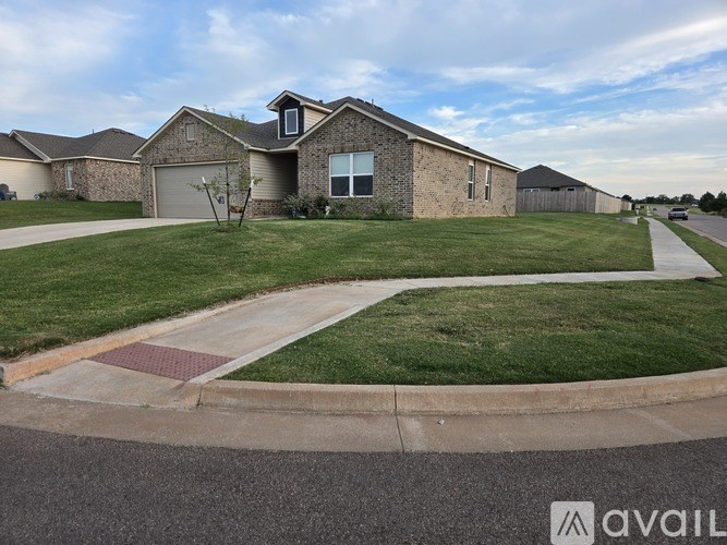 A house with a driveway in front of it.