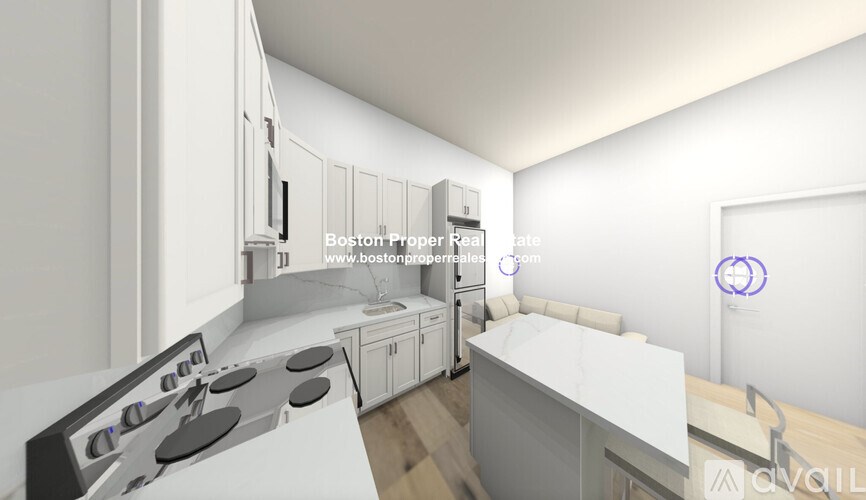 A modern kitchen with white cabinets and a stove top oven.