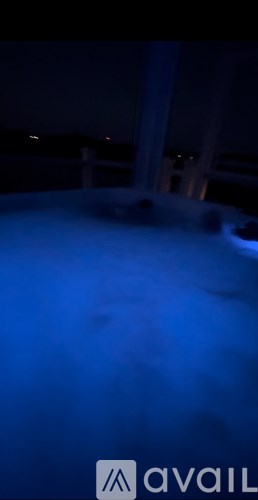 A pool with a blue light.