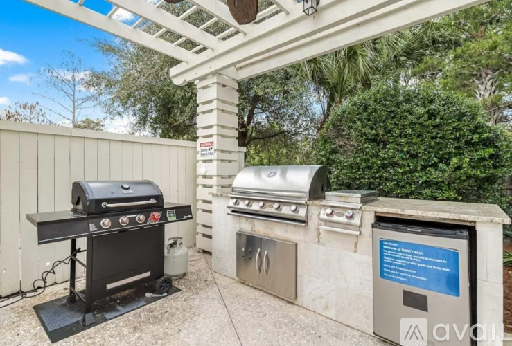 A black grill is on the left and a silver grill is on the right.