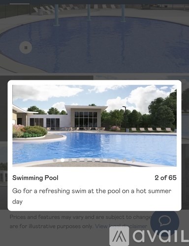 A swimming pool surrounded by a building and trees.