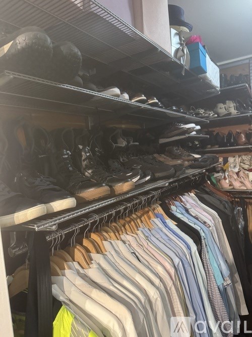 A clothing store with a variety of clothes on display.