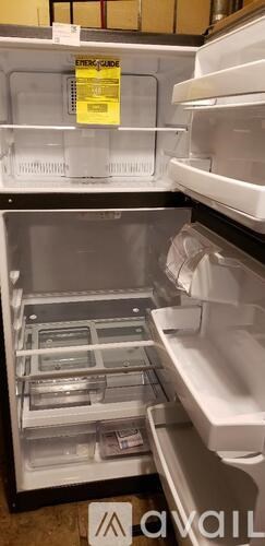 A yellow sticker on the freezer door reads "Energy Saver".