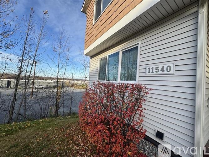 A house with the number 11540 on the front.