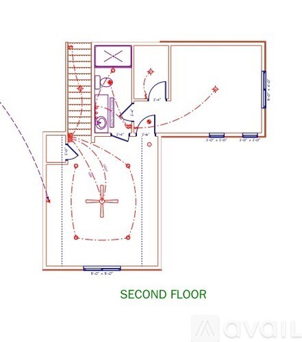 A floor plan of a second floor with a kitchen, living room, and bathrooms.