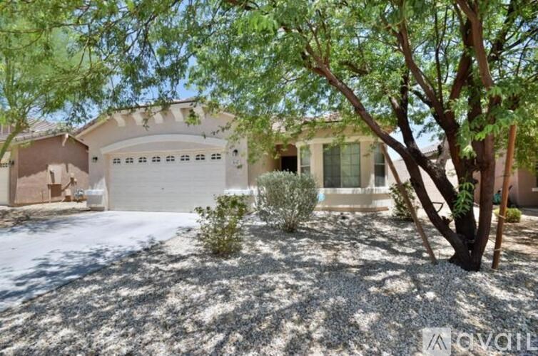 A house with a tree in front of it.