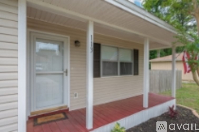 A house with a red front porch.