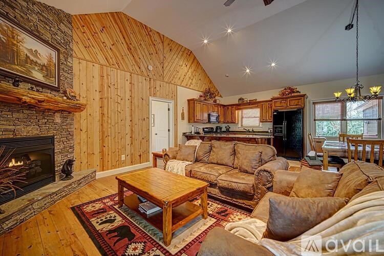 A living room with a fireplace and a couch.