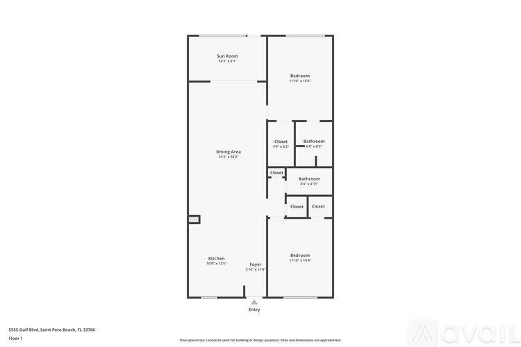 A row of palm trees line a walkway next to a body of water.