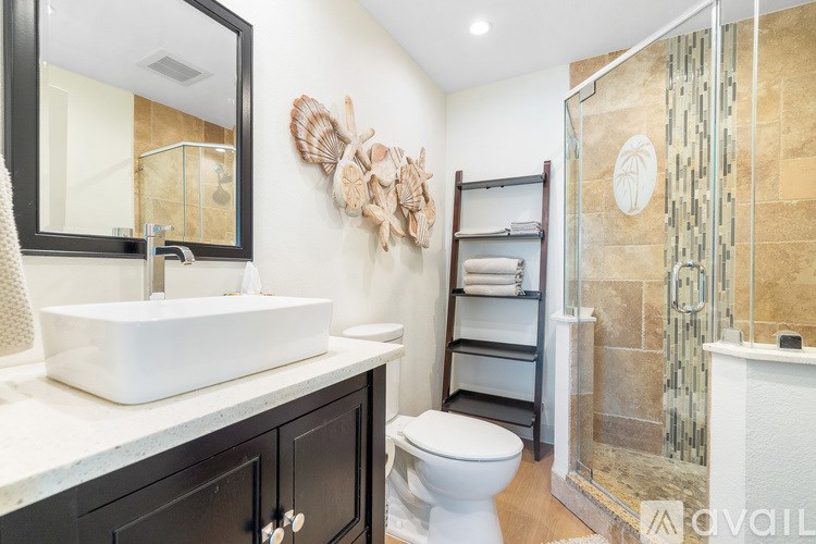 A white door is open to a hallway.