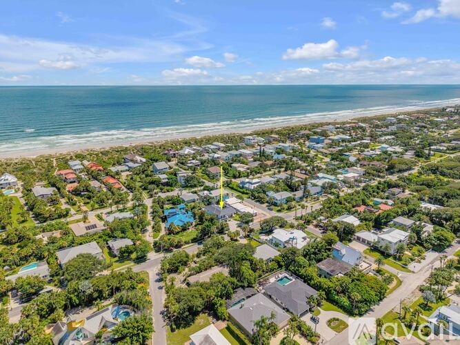 A bird's eye view of a coastal residential area.