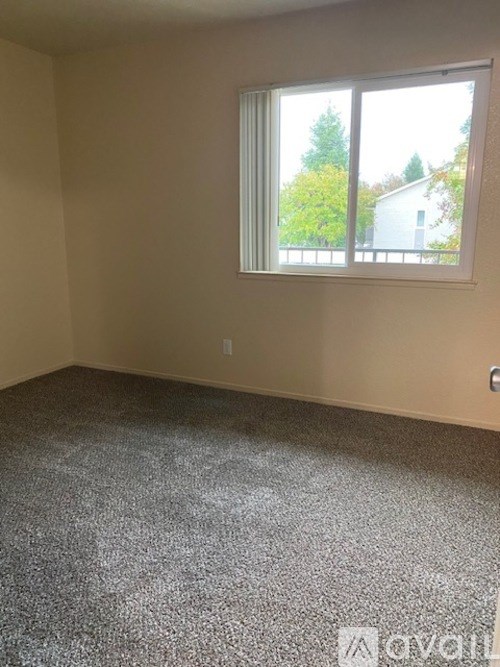 A graphic with a wheelchair and a house symbolizing equal housing opportunity.