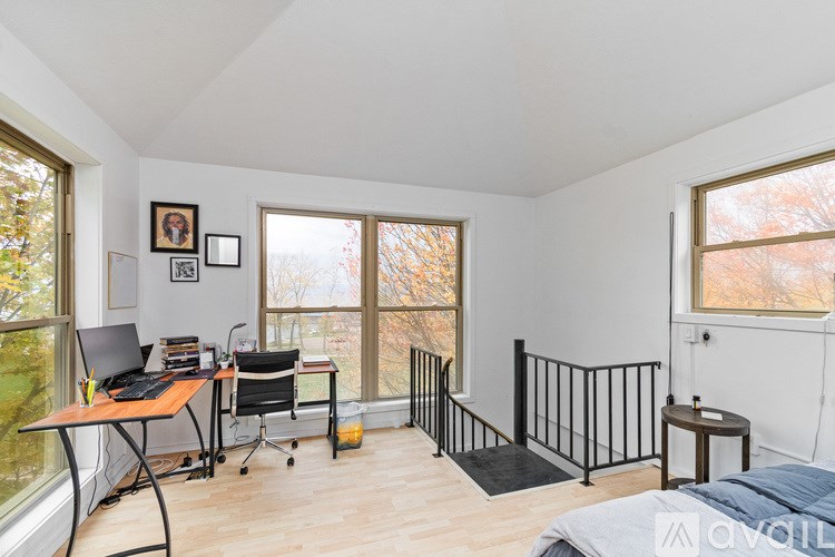 A window with a white frame and a white radiator beneath it.