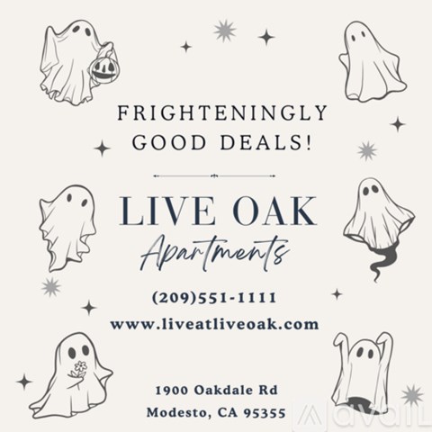 A poster advertising Live Oak Apartments with a spooky ghost theme.