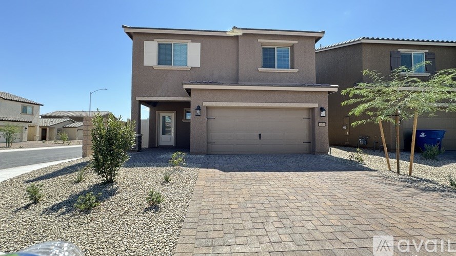 A house with a garage is available for sale.