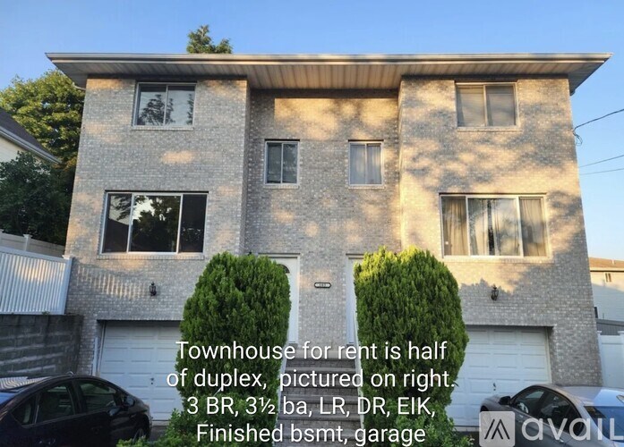 A two-story townhouse with a garage is for rent.