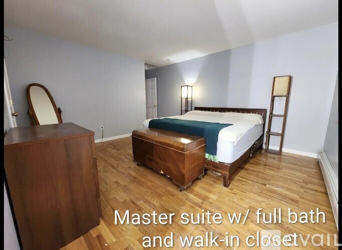 A master suite with a full bath and walk-in closet.