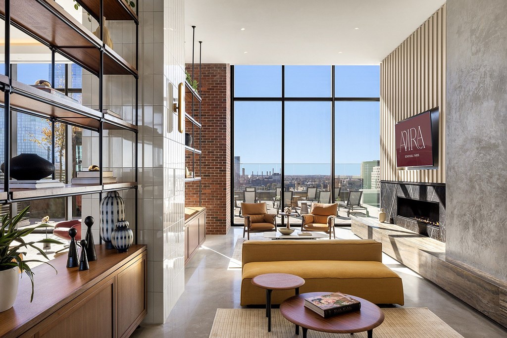 A modern living room with a view of the city.