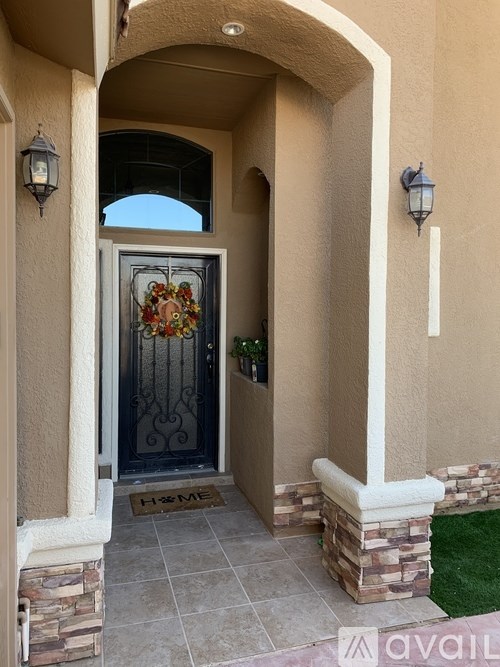 A glass door with a metal frame and a glass window above it.