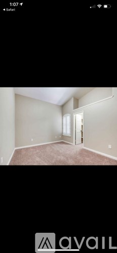 A room with a door and a window.