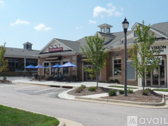 A street view of a commercial area with a vision laser center.