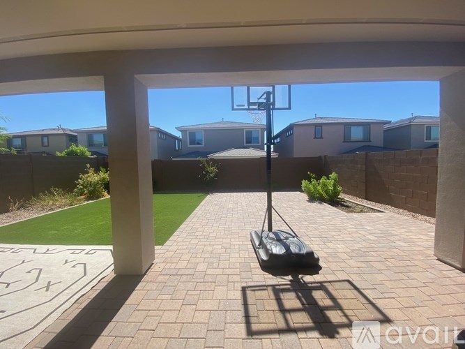 A patio with a black bag on it.