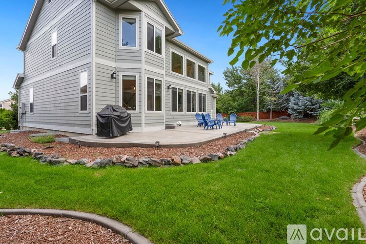 A house with a patio and a garden.
