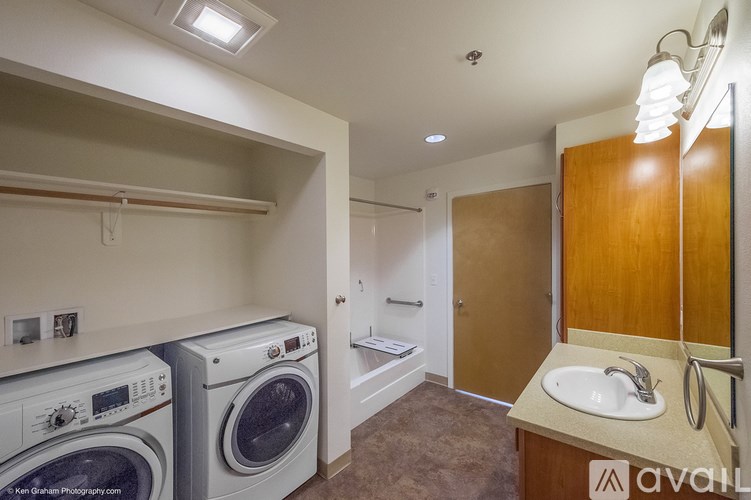 A laundry room with a washer and dryer.