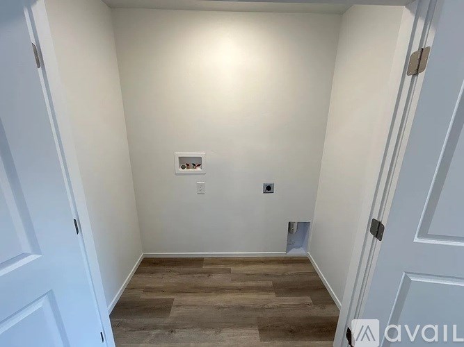 A room with a light switch and a light on.