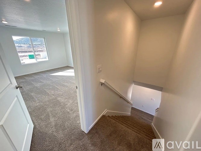 A room with a staircase leading to the second floor.