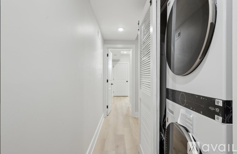 A washing machine is on the right side of the image.