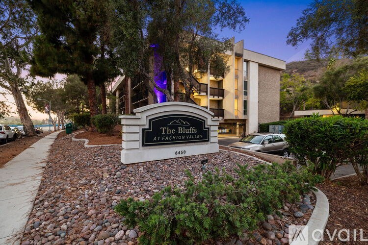 A sign for The Bluffs at Pahrump Valley is shown in front of a building.