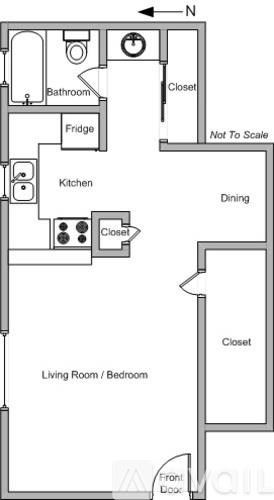 A floor plan of a small apartment with a living room, dining area, kitchen, and bathroom.
