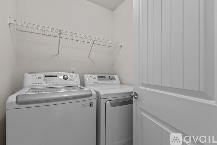 A laundry room with a washer and dryer.