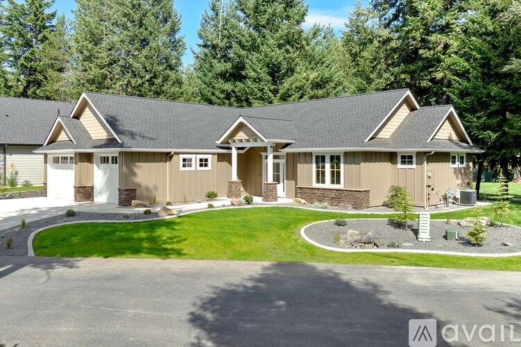 A house with a driveway in front of it.