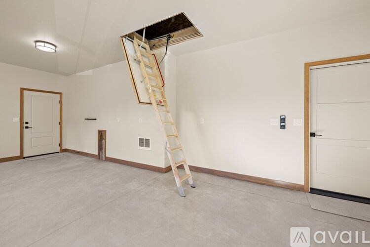A room with a ladder in it.