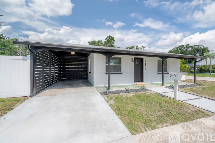 A modern house with a garage and a driveway.