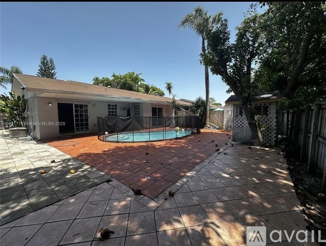 A house with a pool in the backyard.